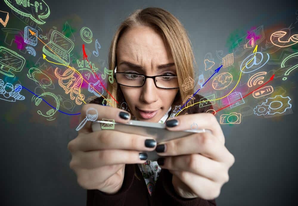Woman holding phone surrounded by colorful digital icons, showcasing marketing concepts like SEO, social media, and web design.